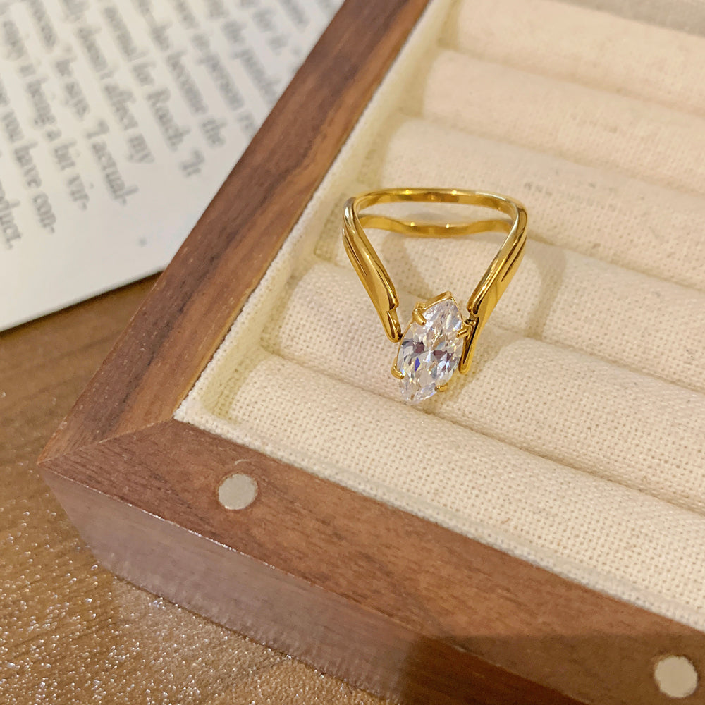 East-West Marquise Solitaire Ring